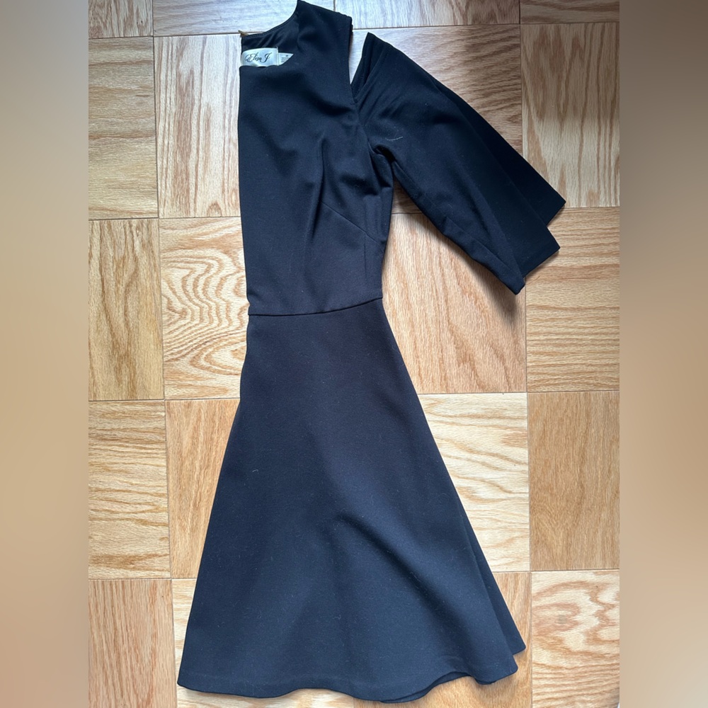 Black A Line Dress with shoulder cut out and pockets!